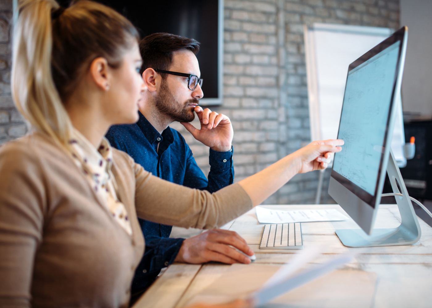 Software engineers working on project and programming in company